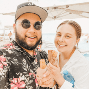 couple eating churros at le blanc spa resort in cancun